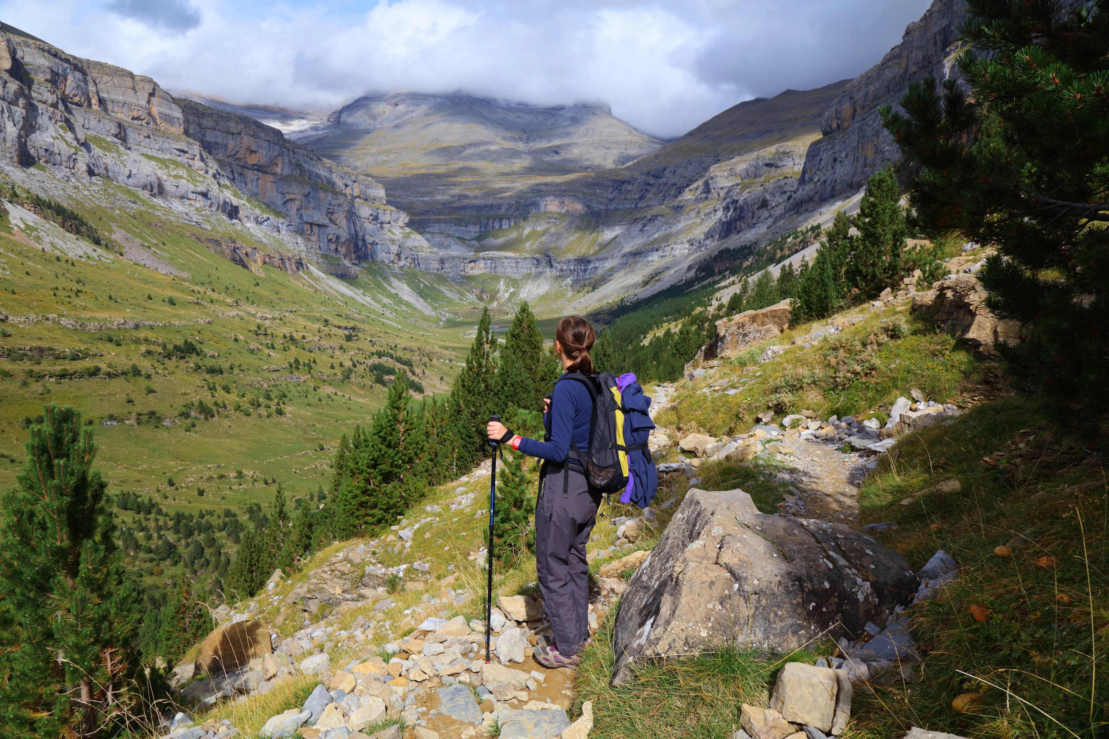 Woman tourist hiking in Spanish Pyrenees